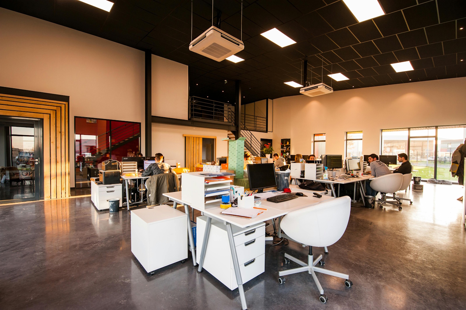 Professional IT team collaborating on digital solutions with modern technology equipment